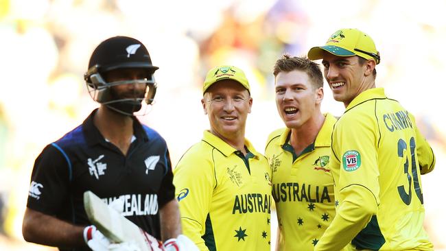 Brad Haddin and James Faulkner give New Zealand's Grant Elliott a send off during the World Cup final.