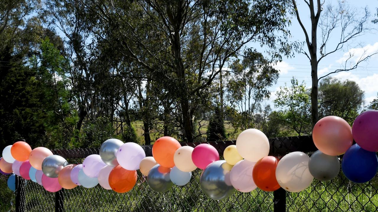 Balloons were tied in an array of colours to fences around Tahmoor in the tribute. Picture: Backgrid via NCA NewsWire