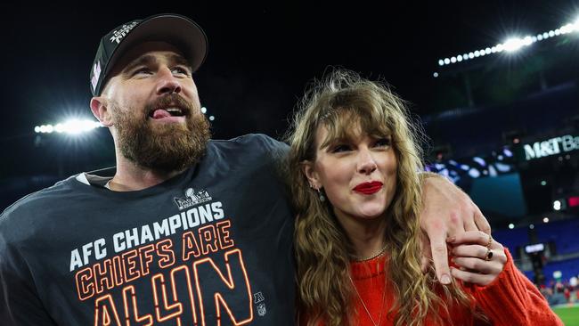 Kansas City’s Travis Kelce celebrates with Taylor Swift after the AFC Championship Game. Picture: Getty