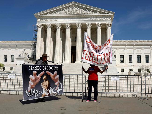 WASHINGTON, DC - APRIL 19: Abortion rights activists hold up signs outside the U.S. Supreme Court Building on April 19, 2023 in Washington, DC. Today U.S. Supreme Court Justice Samuel Alito announced that the Court would extend their stay on a Texas appeals courtâs ruling to restrict the Food and Drug Administrationâs approval of abortion drug mifepristone. The Supreme Courtâs stay will last until 11:59pm April 21st.   Anna Moneymaker/Getty Images/AFP (Photo by Anna Moneymaker / GETTY IMAGES NORTH AMERICA / Getty Images via AFP)