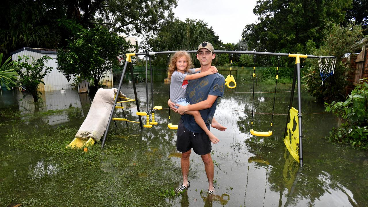 Flash flooding in Townsville after heavy overnight rain. Daniel Leoni, with niece Bella McIlwain, 6, in the backyard of his Suttor Street home in Mysterton. Picture: Evan Morgan