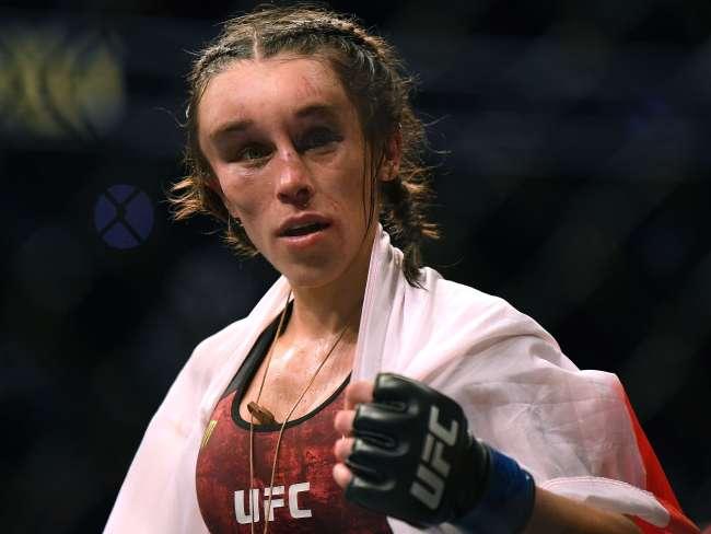 Joanna Jedrzejczyk was left with a gruesome, swollen forehead following her defeat in the fight of the night. Picture: AFP