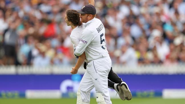 Jonny Bairstow removes a protester early on day one of the second Ashes Test. Picture: Getty Images