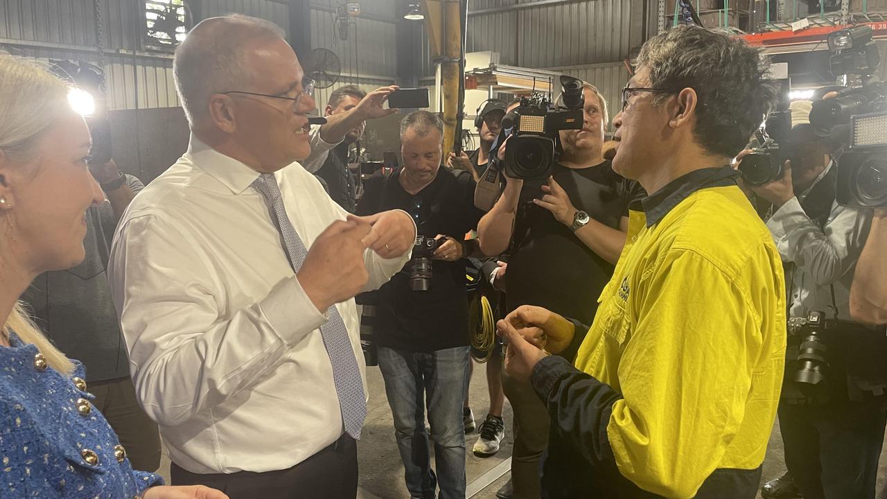 Prime Minister Scott Morrison speaks to Dindo Suela. Picture: Samuel Clench/Supplied