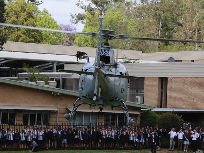 Lieutenant Aaron Cochrane landed his helicopter at his old high school; Carlingford High School for careers day.