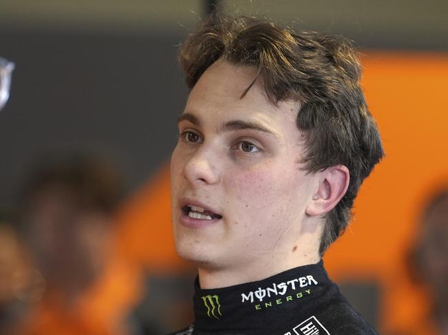 McLaren driver Oscar Piastri of Australia talks with his team after a practice session for the Formula One Miami Grand Prix auto race, Friday, May 2, 2025, in Miami Gardens, Fla. (AP Photo/Rebecca Blackwell)