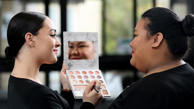 Alexandra Anderson, Greenvale (left) and Gwen Catamura, Broadmeadows, are among four students awarded full scholarships to the Kangan Institute. Picture: Mark Dadswell