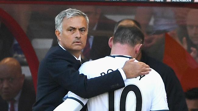 Jose Mourinho and Wayne Rooney.