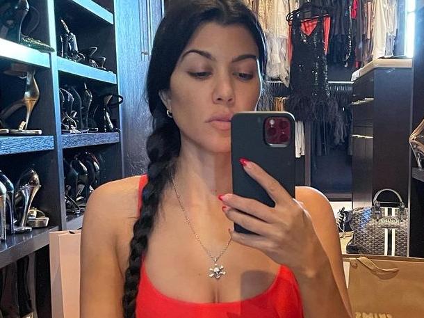 Kourtney Kardashian roasts Kendall Jenner’s red lingerie shoot after backlash. Picture: Instagram/KourtneyKardashian