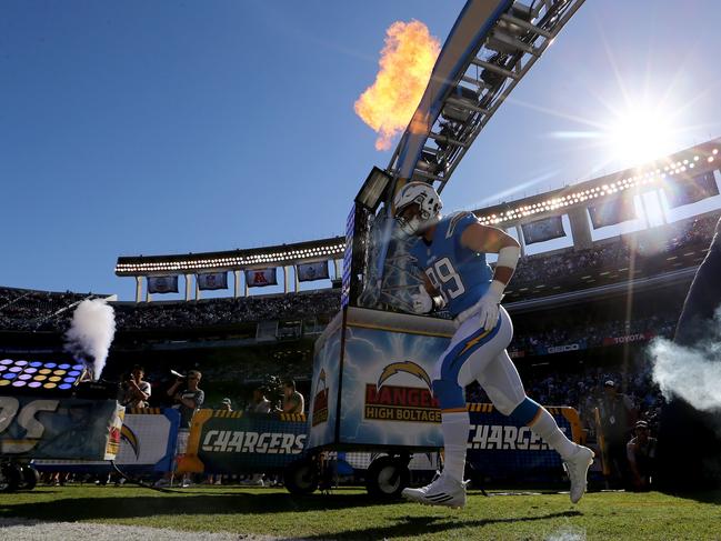 SAN DIEGO, CA - NOVEMBER 06: Joey Bosa #99 of the San Diego Chargers enters the field prior to a game between the San Diego Chargers and the Tennessee Titans at Qualcomm Stadium on November 6, 2016 in San Diego, California. Sean M. Haffey/Getty Images/AFP == FOR NEWSPAPERS, INTERNET, TELCOS & TELEVISION USE ONLY ==