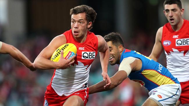 Sydney’s Oliver Florent evades Jack Martin. Picture: Phil Hillyard