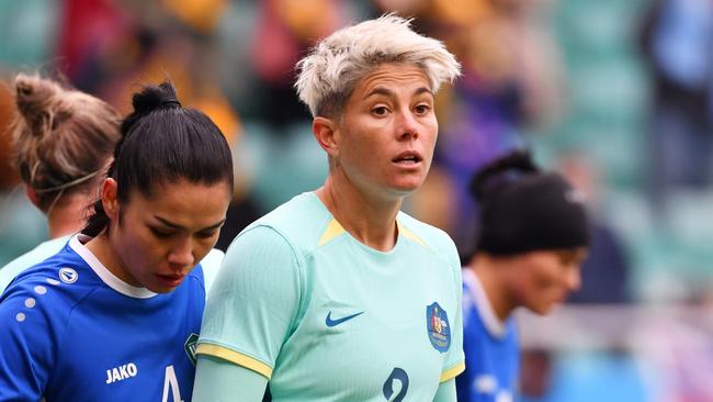 TASHKENT, UZBEKISTAN - FEBRUARY 24: Feruza Bobokhujaeva of Uzbekistan looks on with Michelle Heyman of Australia during the AFC Women's Paris 2024 Olympic Qualifier Round 3 match between Uzbekistan and Australia Matildas at Milliy Stadium on February 24, 2024 in Tashkent, Uzbekistan. (Photo by Tolib Kosimov/Getty Images)