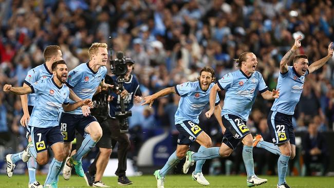 Sydney FC players celebrate the win. Picture: Mark Metcalfe/Getty Images