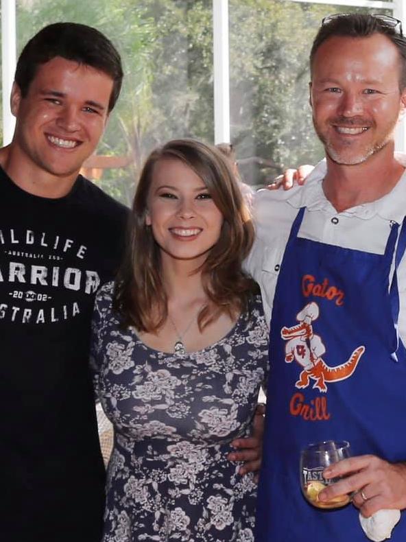 Bindi Irwin with husband Chandler Powell (left) and father-in-law Chris Powell (right). Picture: Facebook