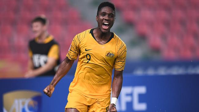 Al Hassan Toure celebrates scoring for Australia’s Under-23s in Thailand.