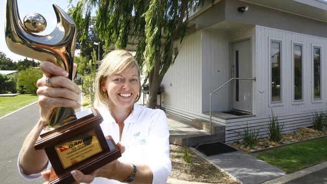 Lorraine Golightly with a major Australian tourism trophy awarded to BIG4 Beacon Resort Queenscliff in 2010. Picture: Glenn Ferguson