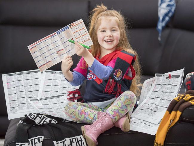 Addison, 4, has the highest tipping success rate in her family. Picture: Jason Edwards