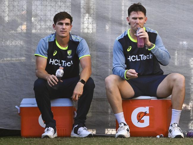 Sean Abbott and Mitchell Marsh have a drink during an Australia training session at Adelaide Oval. Picture: Getty Images