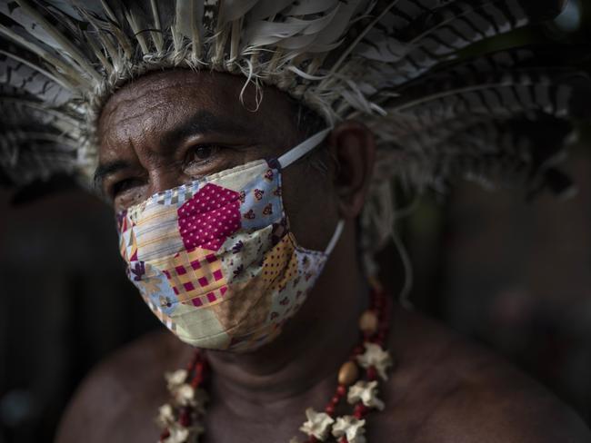 Indigenous leader Pedro dos Santos in Manaus, Brazil recovered from coronavirus drinking tea made of chicory root, garlic and lime but many others have died in the forest. Picture: AP Photo/Felipe Dana