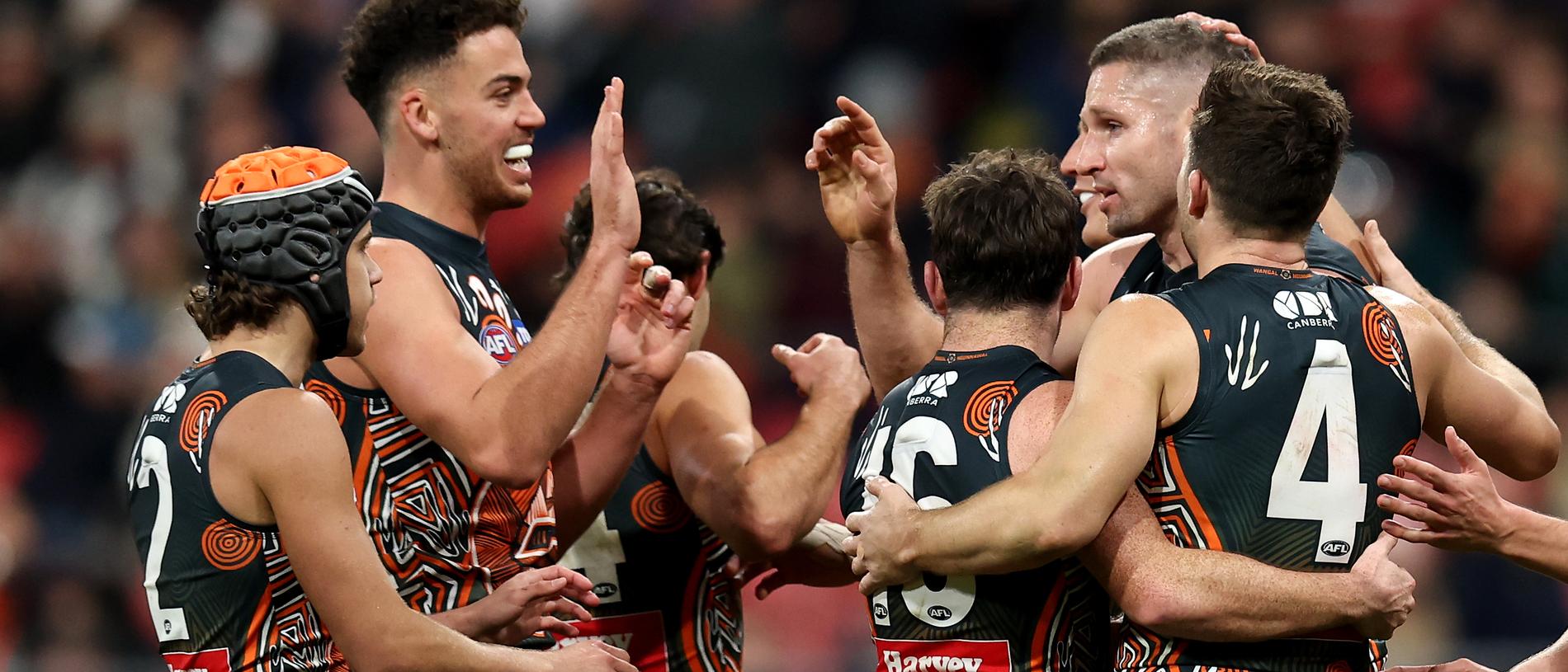 SYDNEY, AUSTRALIA - JULY 06: Jesse Hogan of the Giants celebrates kicking a goal with team mates during the round 17 AFL match between Greater Western Sydney Giants and Carlton Blues at ENGIE Stadium, on July 06, 2024, in Sydney, Australia. (Photo by Brendon Thorne/AFL Photos)