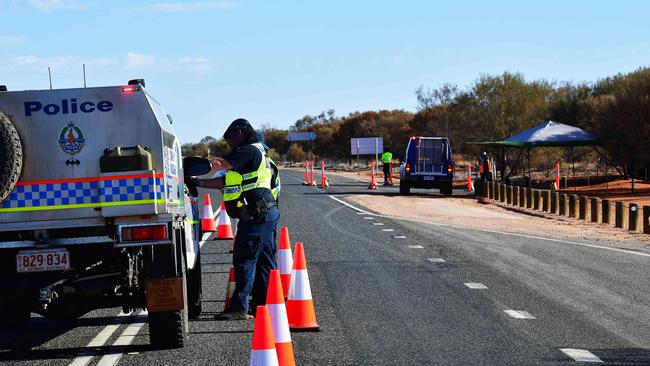 A police checkpoint on the Northern Territory/South Australia border ... Chief Minister Michael Gunner said today that the Territory’s border controls will likely be the last restrictions to be lifted. Picture: Chloe Erlich