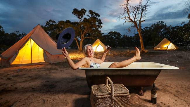 Di Koop kicks back and relaxes at Nhillbilly Farm Glamping, a B&amp;B farm stay in Victoria’s far west. Picture: Alex Coppel