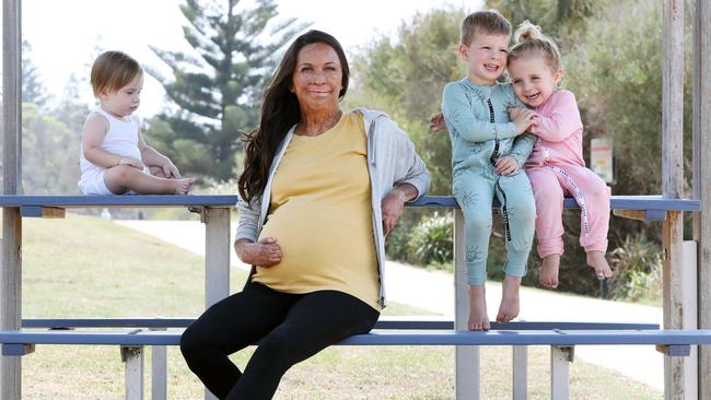 Pregnant Turia Pitt at Mollymook Beach, promoting Bonds Baby Search with Brooklyn Howcroft, 10 months, Penelope Chave-Dubois, 2, and Hunter Burgess, 3. Picture: Jonathan Ng