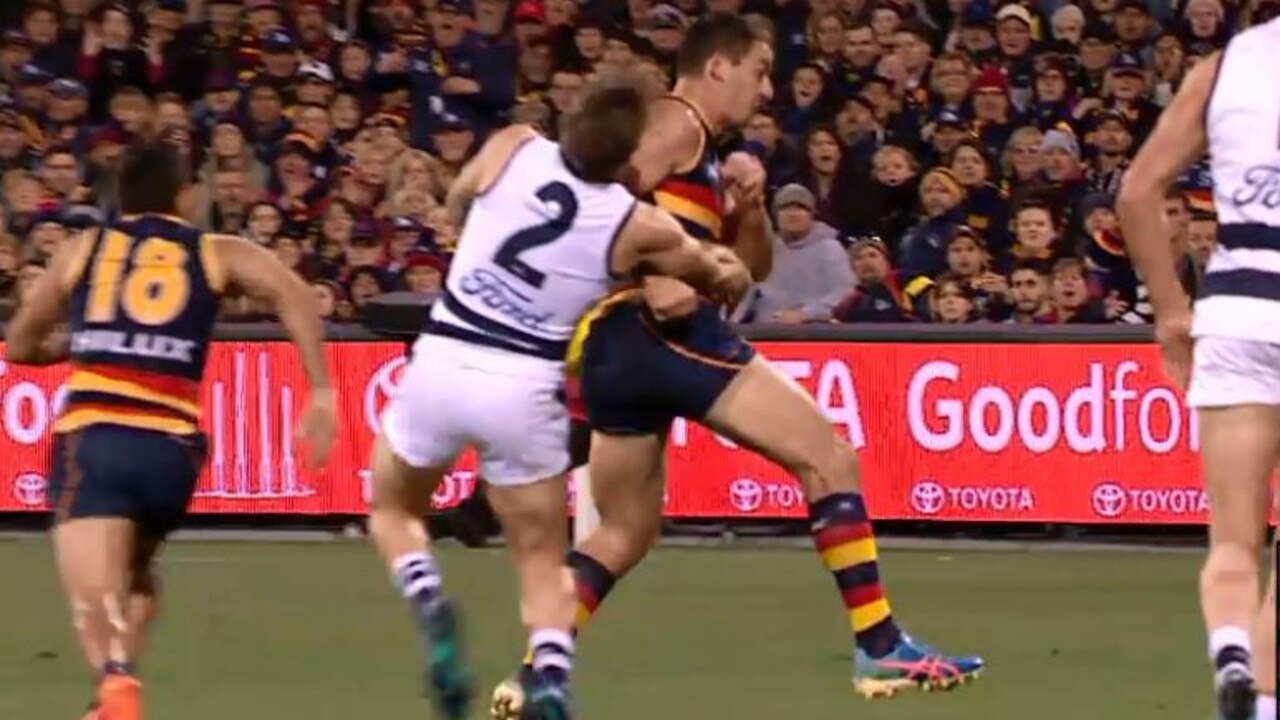 Taylor Walker cleans up Zach Tuohy.