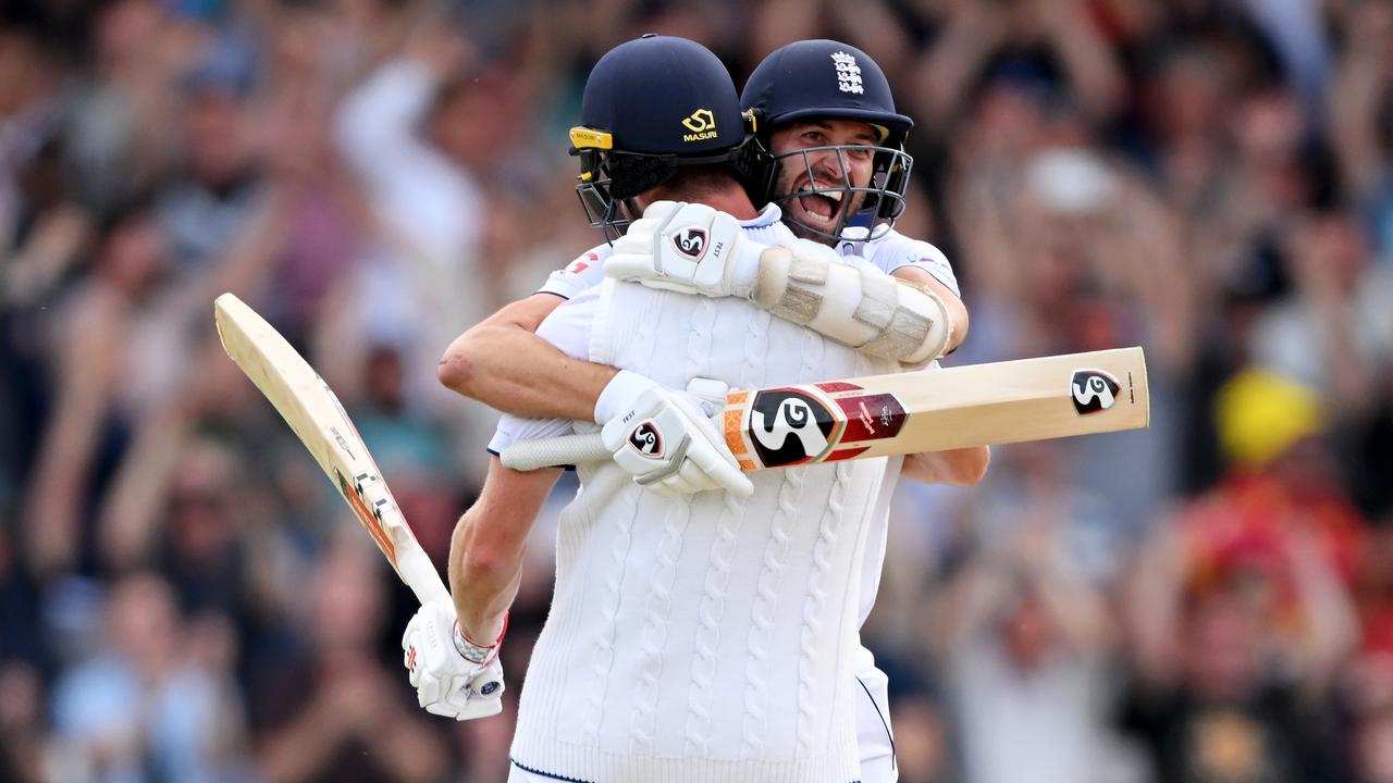 Chris Woakes celebrates with teammate Mark Wood after hitting the winning runs to win the third Ashes Test. Picture: Getty