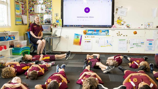 Scarborough State School teacher Rachel Bradbury with students. Picture: Richard Walker