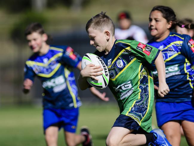 Jax Ellis on the way to try for Fairview Heights State School in the inaugural Primary Interschools Reconciliation Touch Carnival hosted by Glenvale State School, Wednesday, May 28, 2025. Picture: Kevin Farmer