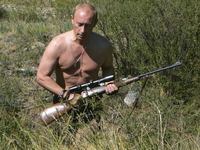 Vladimir enjoys long, shirtless walks through the scrub with a gun and describes himself as down to earth with a good sense of humour and is looking for a non-smoker who likes world domination and annihilation. Sorry, he misspoke on the last bit, he is looking for someone who wants world peace. Picture: AP Photo/ RIA Novosti