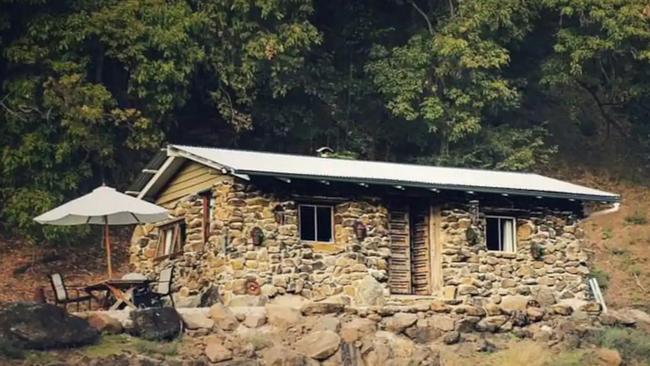 This Rustic Stone Cottage in West Woombye is among the coolest and quirkiest Airbnb stays in Queensland. Picture: Airbnb