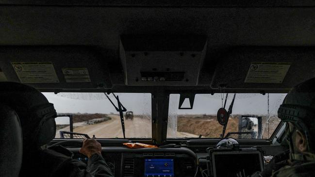 Israeli soldiers drive in Gaza’s main southern city of Khan Younis last month as part of a media tour. Picture: Nicolas Garcia/Agence France-Presse/Getty Images