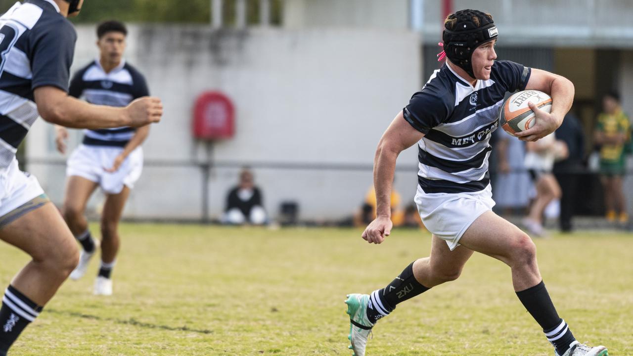 Adam Kelly of Met East against Sunshine Coast.