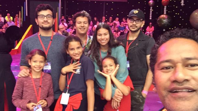 Jay Laga’aia with seven of his eight kids at Carols in the Domain. Picture: Supplied