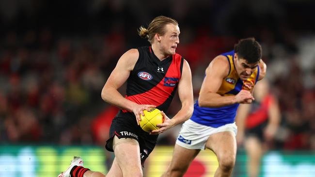 MELBOURNE, AUSTRALIA – AUGUST 05: Mason Redman of the Bombers in action during the round 21 AFL match between Essendon Bombers and West Coast Eagles at Marvel Stadium on August 05, 2023 in Melbourne, Australia. (Photo by Graham Denholm/AFL Photos via Getty Images)