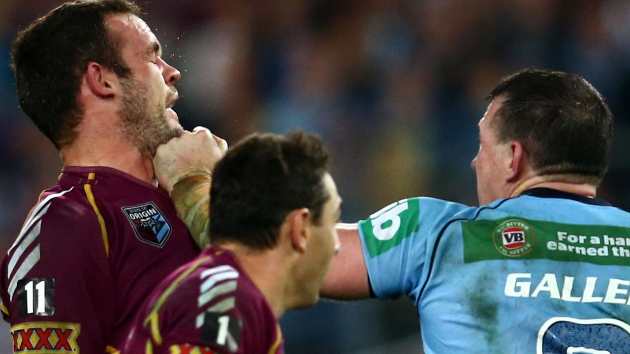 SYDNEY, AUSTRALIA - JUNE 05: Paul Gallen of the Blues punches Nate Myles of the Maroons during game one of the ARL State of Origin series between the New South Wales Blues and the Queensland Maroons at ANZ Stadium on June 5, 2013 in Sydney, Australia. (Photo by Mark Kolbe/Getty Images)