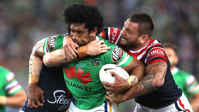 Canberra’s Iosia Soliola cops a high one from' Jared Waerea-Hargreaves. Picture. Phil Hillyard