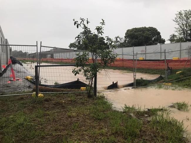 This photo was taken on Sunday by a resident of the flats at 1 Poinciana Street from the back (north side) of the pod site. This is after 100mm. Source: Louise Gordon