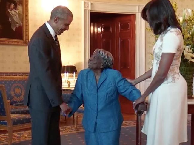 Feel-good story ... Virginia McLaurin, 106, meets the Obamas. Picture: The White House