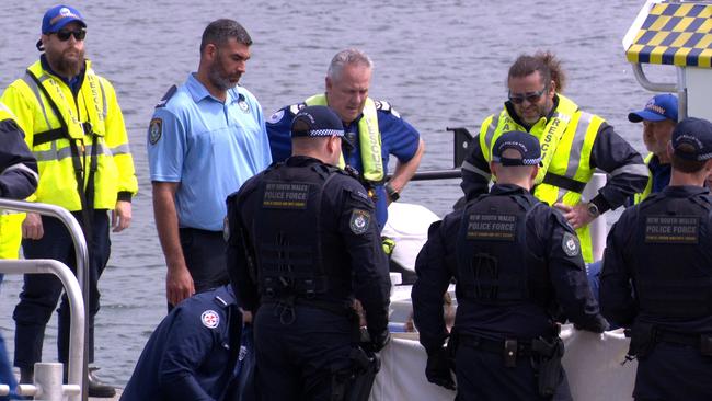 Paramedics and water police at the Vaucluse wharf following Mr Westacott’s death on Sunday. Picture: OnScene Bondi