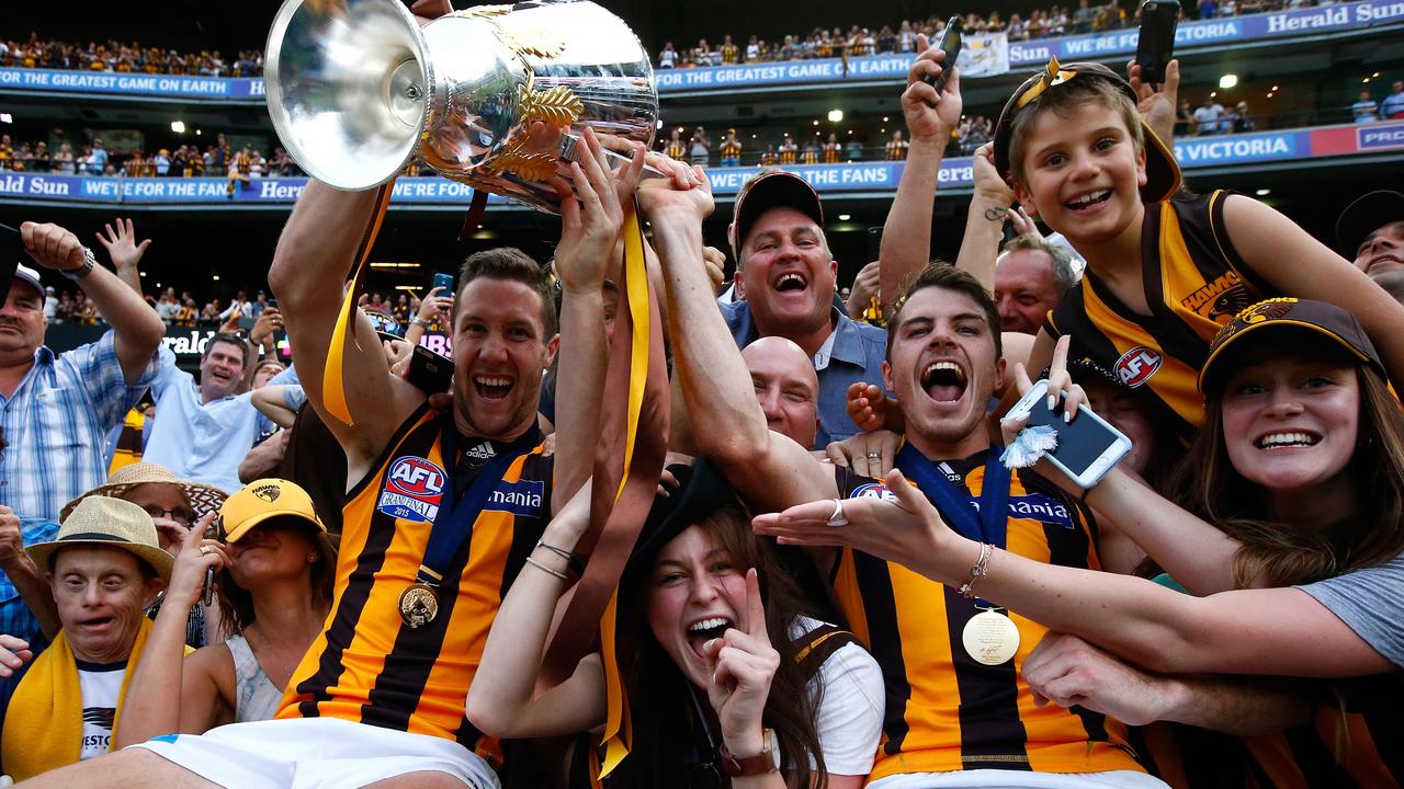 James Frawley and Isaac Smith celebrate the Hawks’ 2015 AFL Grand Final victory