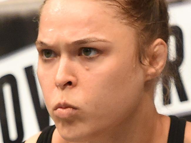 LOS ANGELES, CA - FEBRUARY 28: Ronda Rousey enters the Octagon in her UFC women's bantamweight championship bout against Cat Zingano during the UFC 184 event at Staples Center on February 28, 2015 in Los Angeles, California. (Photo by Harry How/Getty Images)