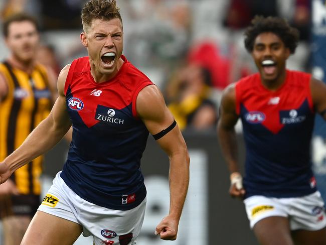 MELBOURNE, AUSTRALIA - APRIL 18: Jake Melksham of the Demons celebrates kicking a goal during the round five AFL match between the Hawthorn Hawks and the Melbourne Demons at Melbourne Cricket Ground on April 18, 2021 in Melbourne, Australia. (Photo by Quinn Rooney/Getty Images)