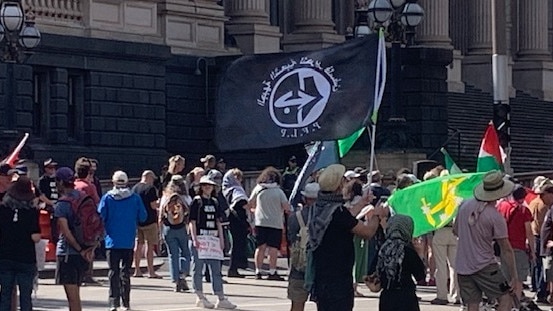 The flag of the internationally recognised terrorist organisation Popular Front for the Liberation of Palestine was seen flying amid the placards and banners at an ‘anti-Zionist’ pro-Palestine demonstration in Melbourne on Sunday.