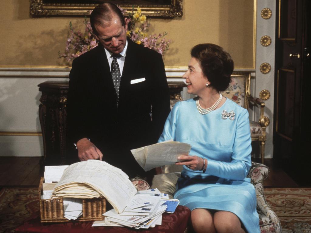 In 1972, the Queen and Duke of Edinburgh celebrated their silver wedding anniversary and were pictured sorting through a basket of mail offering good wishes. In a speech at the time the Queen said: “If I am asked what I think about family life after 25 years of marriage, I can answer with equal simplicity and conviction, I am for it.” Picture: Hulton Archive/Getty