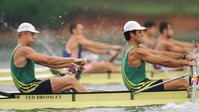 Wesfarmers chief executive Rob Scott, right, with David Weightman in the coxless pairs at the Atlanta Olympics in 1996. Now Scott rows on Swan River