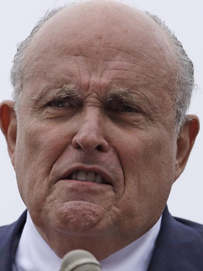 Donald Trump’s personal lawyer Rudy Giuliani is under fire for his association with two businessmen on campaign finance charges. Picture: AP