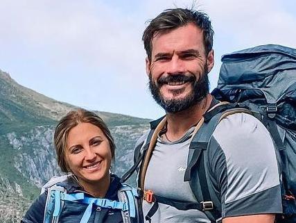 Bachelor 2020 Locky Gilbert and his partner Irena Srbinovska are travelling around Tasmania at the moment -- pictured hiking at Cradle Mountain. Photo: Instagram